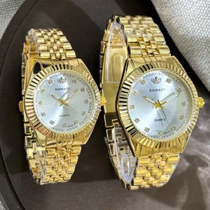Klassisches Paar-Quarzuhr-Set mit goldenem Edelstahlarmband und Strass-Markierungen.