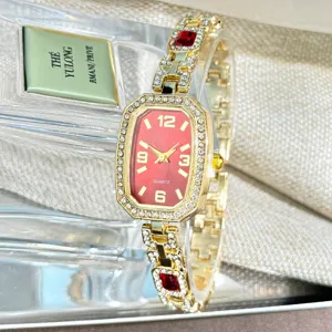 Exquisite detail of women rhinestone quartz watch with red dial, oval square case and crystal bracelet.