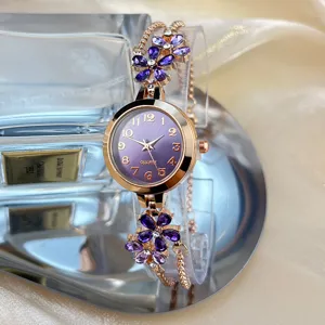 Women's quartz watch with purple floral crystal bracelet, elegant rose gold finish dress watch.