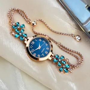 Women's rose gold quartz watch with blue crystal flower bracelet strap elegant design detail