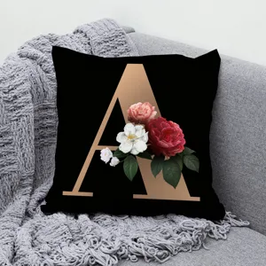 Black and gold letter A throw pillow cover with floral rose pattern for sofa living room decor.