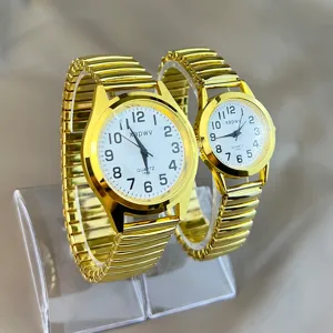 Goldene Paar Quarzuhren mit elastischen Zugbändern, weißem Zifferblatt und arabischen Zahlen.