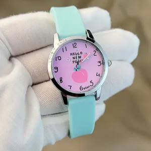 Detailaufnahme Kinder Quarzarmbanduhr, mintgrünes Silikonarmband, rosa Pfirsich Zifferblatt.