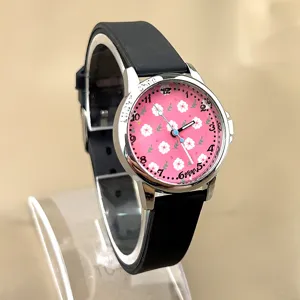 Kinder Quarzuhr mit rosa Blumen Zifferblatt und schwarzem Silikonarmband, ideal für Mädchen.