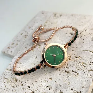 Elegant women quartz watch with green dial rose gold adjustable bracelet and crystal stones.