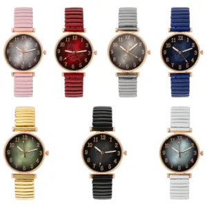 Modische Damen Quarzuhr mit elastischem Metallarmband und klassischem Zifferblatt.