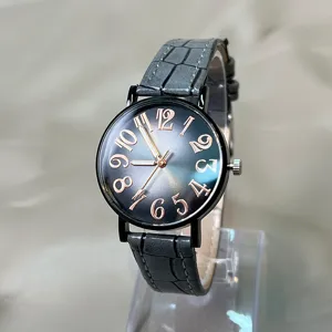 Reloj de cuarzo para mujer con esfera degradada y correa de piel con motivo de cocodrilo.
