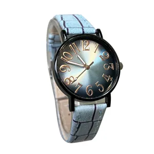 Reloj de cuarzo para mujer con esfera degradada y correa de cuero azul, diseño elegante diario.