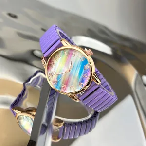 Lila Stretch Armband Quarz Armbanduhr mit Regenbogen Zifferblatt, stylische Damen Uhr.
