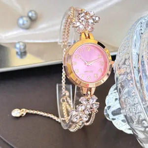 Rose gold flower rhinestone bracelet watch for women, stylish quartz wristwatch with pink dial.