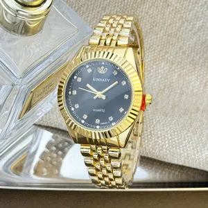Elegante goldene Damen Quarz Armbanduhr mit schwarzem Zifferblatt und Metallarmband.