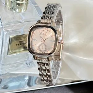 Luxury faceted glass square quartz women watch with elegant diamond dial and metal strap.