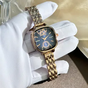 Close-up detail view of the elegant square quartz watch featuring faceted glass and shiny strap.