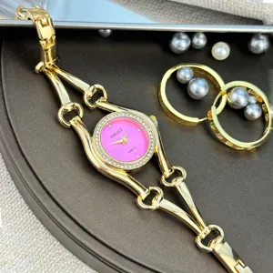 Gold Damen Quarz Uhr Detail rosa Zifferblatt Strass Lünette elegante Kette Armband Mode