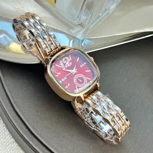 Elegant square quartz women's watch with striking red rhinestone dial and rose gold metal bracelet.