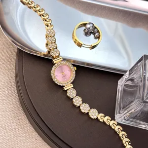 Elegant women rhinestone bracelet watch pink dial quartz fashion alloy wristwatch set.