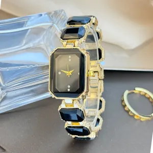 Damen Quarzuhr quadratisch mit schwarzen Kristallgliedern goldfarben Luxus Mode Armbanduhr