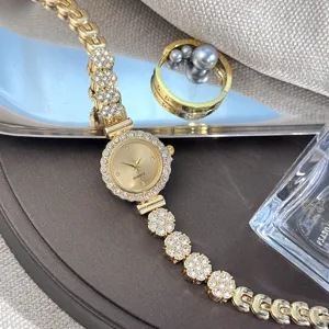 Women's gold quartz watch with rhinestone bracelet chain, elegant sparkling small dial design.