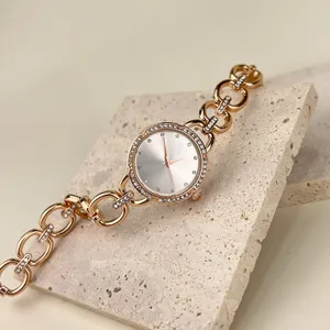Elegante Damen Roségold Strass Quarzuhr mit stilvollem Gliederarmband für elegante Anlässe.