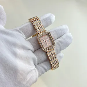 Women square rhinestone quartz watch, luxury rose gold bling wristwatch for daily wear.