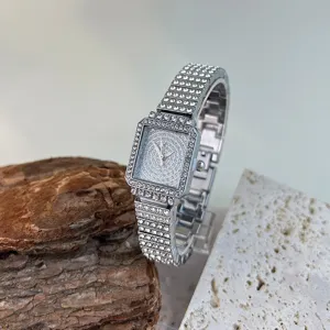 Women's square quartz wristwatch full rhinestones luxury silver elegant sparkly accessory.