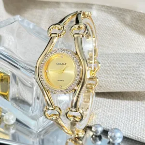 Elegante goldene Damen Quarzuhr mit Strass und stilvollem Armreif Design für Frauen
