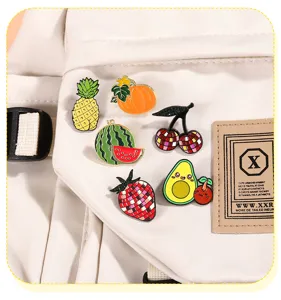 Cute fruit enamel pins set featuring pineapple, watermelon, and strawberry for backpack decor.