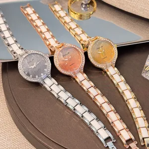 Detailed view of women quartz watches with gradient starry dials and ceramic link bands.