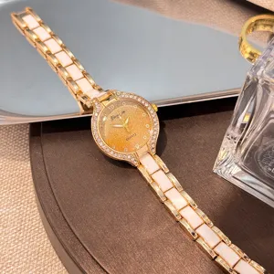 Elegant women quartz watch with glittering dial, rhinestone bezel and ceramic bracelet strap.