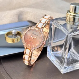 Women's rose gold quartz watch with white ceramic bracelet and gradient glitter dial