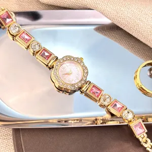 Crystal flower quartz watch for women, elegant pink gemstone bracelet wrist watch jewelry.