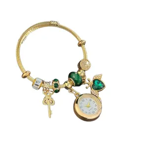 Pandora style charm bracelet quartz watch with green beads, key and heart pendants for women.