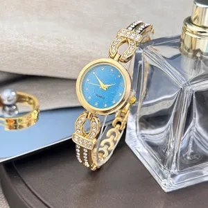 Luxus Damen Strass Quarzuhr Blau Glitzer Zifferblatt Elegante Mode Armbanduhr