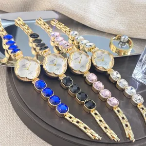 Reloj de pulsera de cuarzo para mujer con esfera de trébol y cristales elegantes