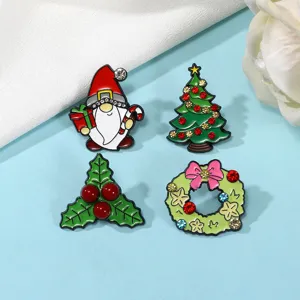 Niedliches Weihnachtsbrosche-Set mit Weihnachtsmann, Baum, Kranz und funkelnden Strasssteinen.