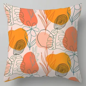 Housse de coussin géométrique détail, motif floral abstrait rose et orange pour canapé.