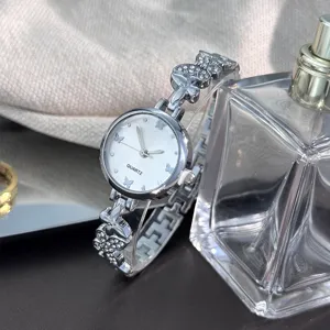 Silberne Damen Quarz Uhr mit Strass Schmetterling Armbanduhr elegante Mode Zeituhr