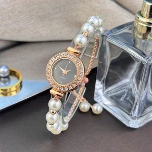 Detailed view of the elegant rhinestone pearl quartz watch with adjustable bracelet band.