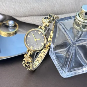 Modische Damen Quarz Armbanduhr Vintage Luxus Kristall Schmetterling Uhr für Frauen
