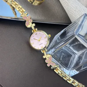 Modische Damen Quarzuhr mit rosa Strass Schmetterling Armband und Zifferblatt.