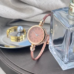 Roségold Armband Quarzuhr für Damen, stilvolles rosafarbenes Zifferblatt Damenuhr.