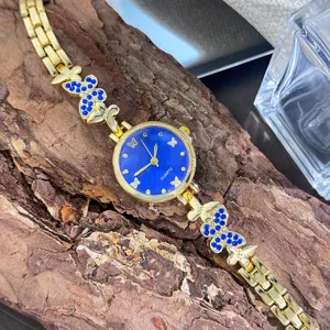 Damen Quarzuhr Luxus Gold Armbanduhr blaues Zifferblatt Schmetterling Strass Schmuck Design