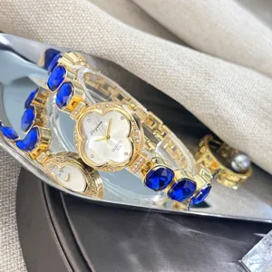 Reloj de cuarzo para mujer trébol dorado cristales azules pulsera elegante accesorio