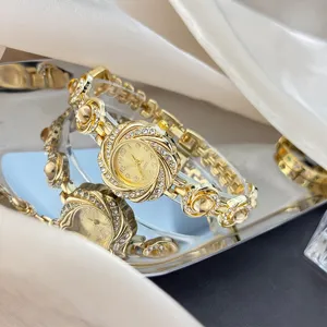 Goldene Strass Quarz Damenuhr Armband Luxus Nische Design elegante Blumen Armbanduhr Schmuck