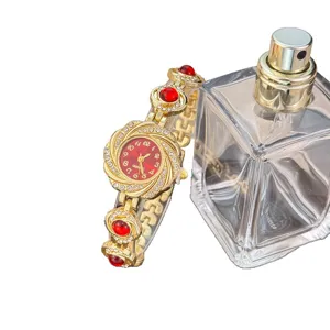 Luxus Damen Quarzuhr in Gold mit rotem Stein Sonnenblume Armbanduhr modischer Zeitmesser