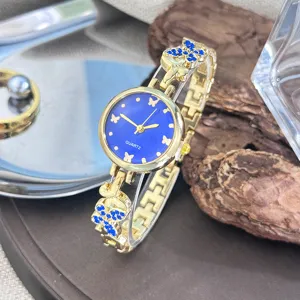 Elegante Damen Quarzuhr goldfarbene Armbanduhr mit blauem Zifferblatt und Strasssteinen