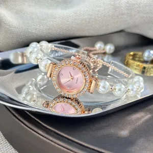 Detail shot of the rose gold women pearl watch with rhinestone bezel and adjustable chain.