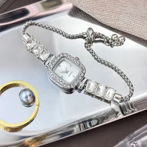 Exquisite rhinestone square dial quartz watch detail, adjustable drawstring bracelet design.