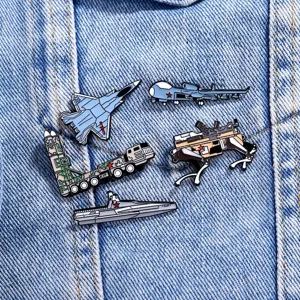 Military themed enamel pin set detail view, metal fighter jet and drone badges close up decoration