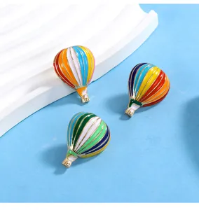 Colorful hot air balloon brooch detail, exquisite enamel craft for clothing decoration.